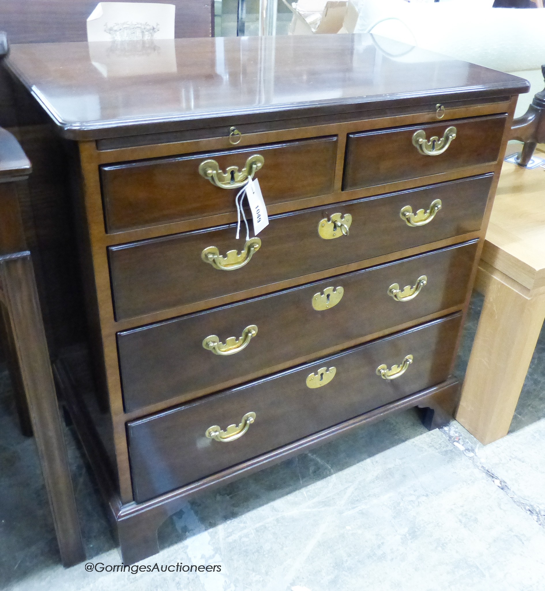 A modern Kittinger furniture George III style mahogany chest with 2 short and 3 long draws. W-76, D-45, H-76cm.